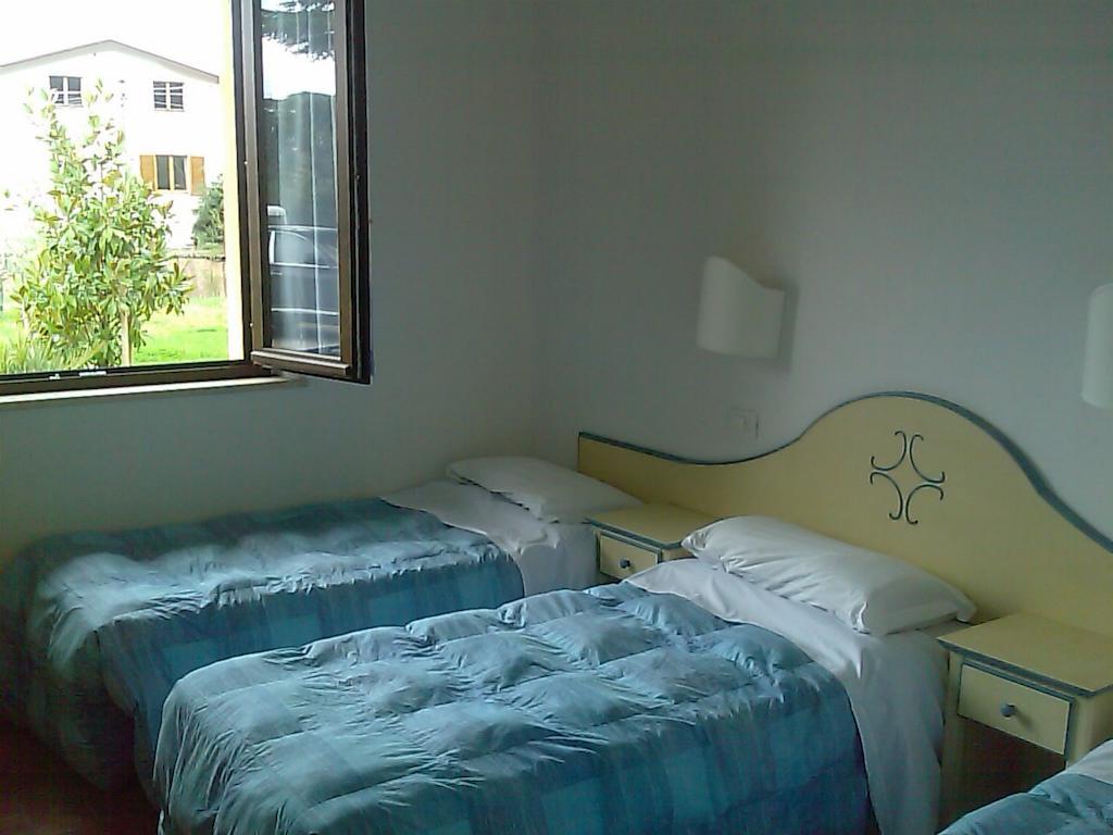 Ostello Victor Center Asís Habitación foto